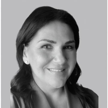 A_black_and_white_professional_headshot_portrait_resized